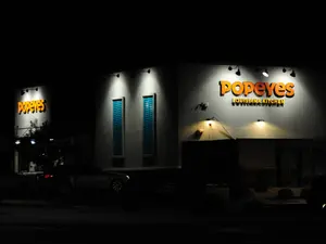 Popeyes® Manager Shot Coworker Over Biscuits